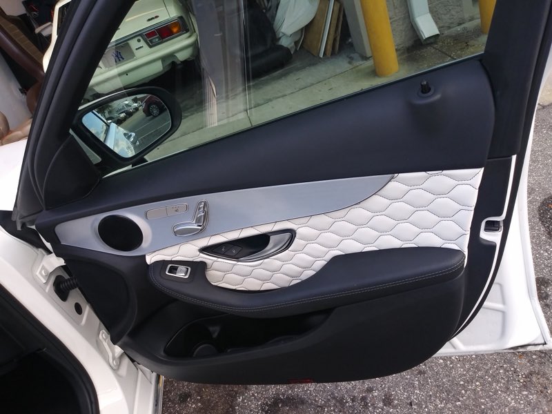 Custom white diamond-stitch door panel